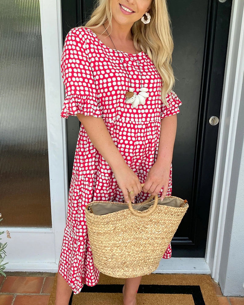 Noor | Midi-jurk met ronde hals en stippenprint