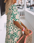 Sara | Losse Jurk met V-hals en Print