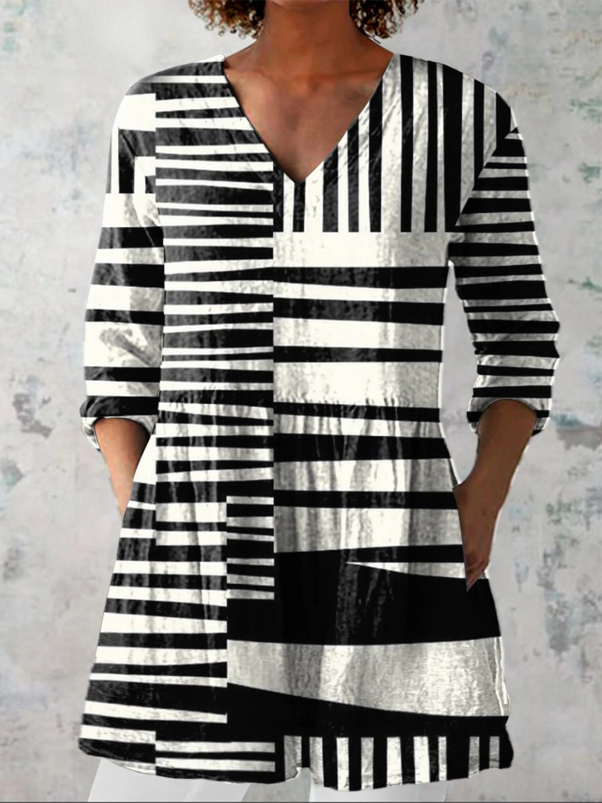 Capri | Blusa lunga a forma di V