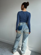 JEANS STRAPPATI VIRALI