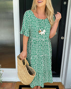 Noor | Midi-jurk met ronde hals en stippenprint