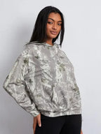 FELPA UNISEX CAMO CON CAPPUCCIO