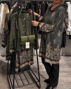 VINTAGE REVERSJURK MET PRINT EN KNOPEN