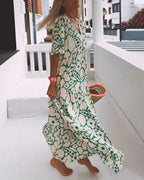 Sara | Losse Jurk met V-hals en Print