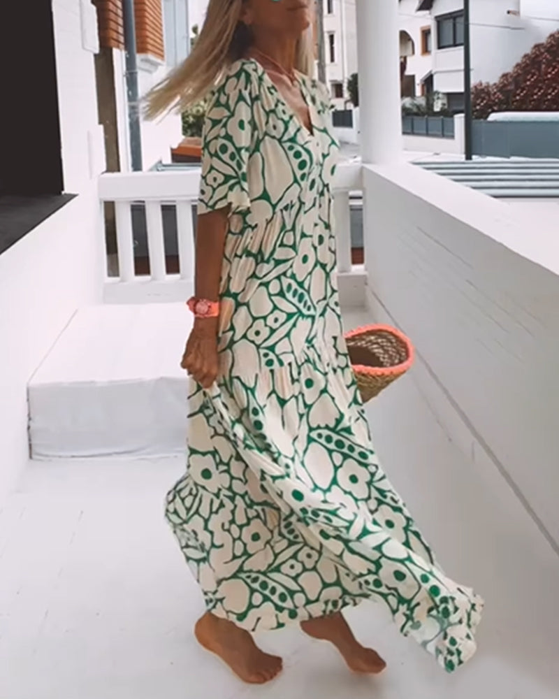 Sara | Losse Jurk met V-hals en Print