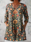 Elara | Blusa lunga con scollo a V