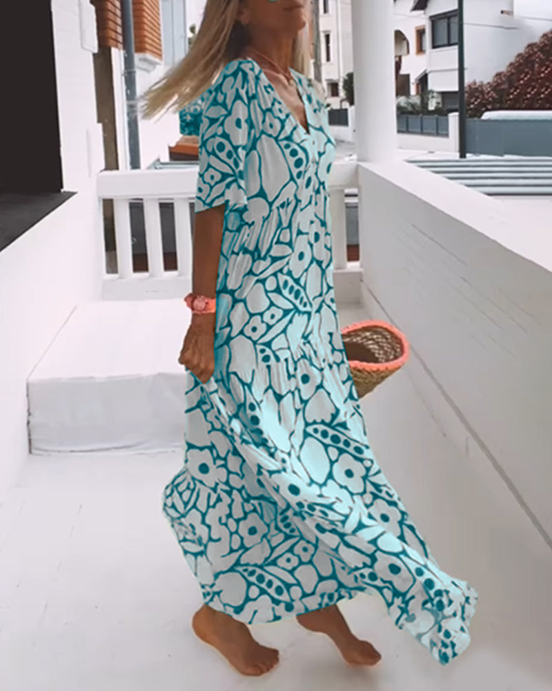 Sara | Losse Jurk met V-hals en Print