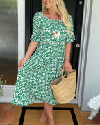 Noor | Midi-jurk met ronde hals en stippenprint