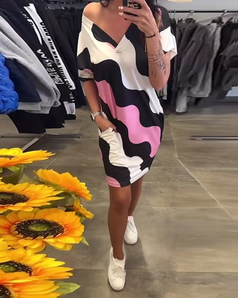 Emma | V-hals jurk met wavepatroon