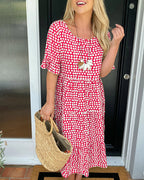 Noor | Midi-jurk met ronde hals en stippenprint