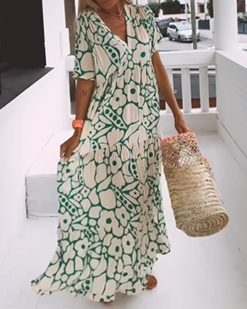 Sara | Losse Jurk met V-hals en Print