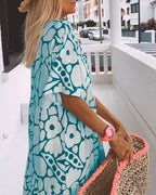 Sara | Losse Jurk met V-hals en Print