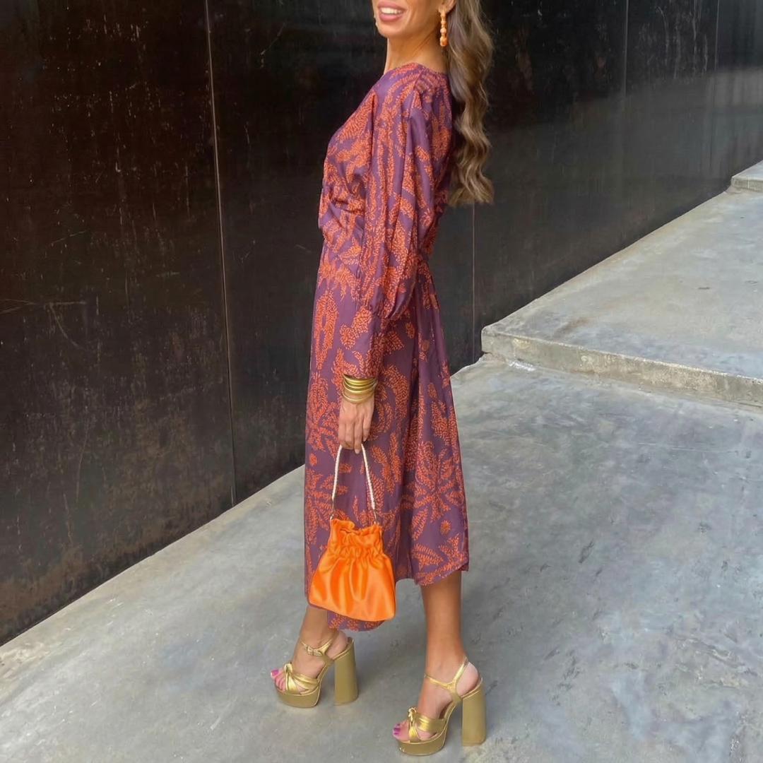 Isadora™ – Elegante abito midi con dettagli color nudo e stampa artistica
