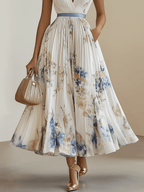 Chloe | Grembiule midi plissettato in chiffon floreale bianco con scollatura a V