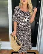 Noor | Midi-jurk met ronde hals en stippenprint