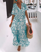 Sara | Losse Jurk met V-hals en Print