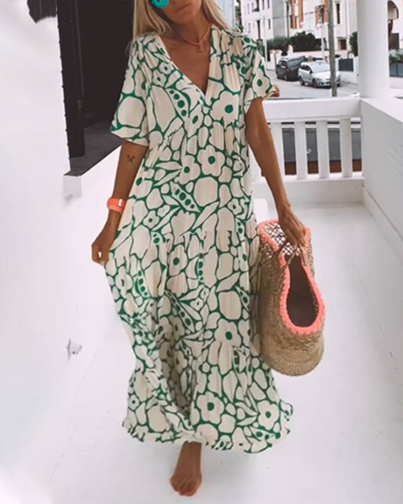 Sara | Losse Jurk met V-hals en Print