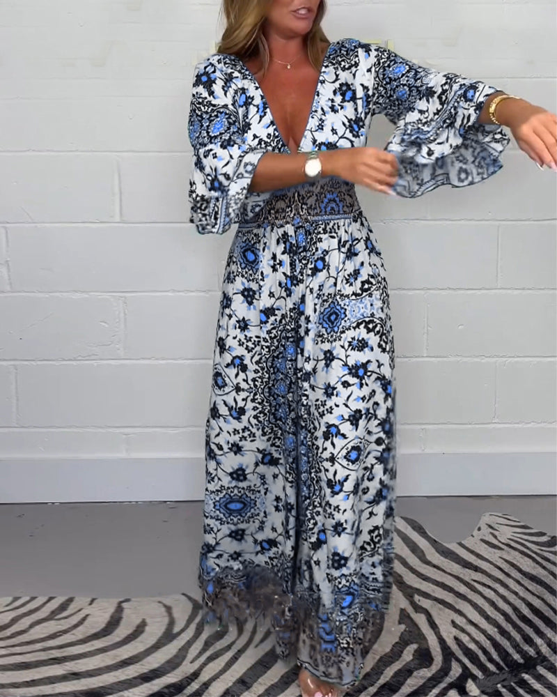 Sophie | Bedrukte Jumpsuit met Diepe V-Halslijn