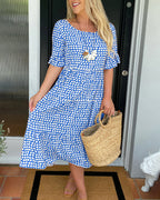 Noor | Midi-jurk met ronde hals en stippenprint