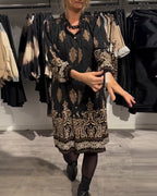 VINTAGE REVERSJURK MET PRINT EN KNOPEN
