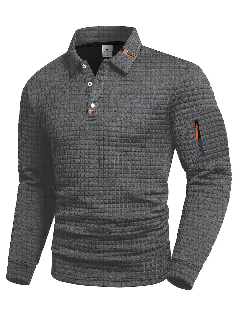 Polo met structuur en zakje op de mouw