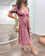 Jurk met diepe V-hals en stippen
