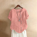 Damesblouse van lino con bottoni decorativi
