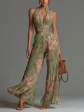 Suze | Vloeiende Geplooide Jumpsuit ha incontrato Groene Bloemen