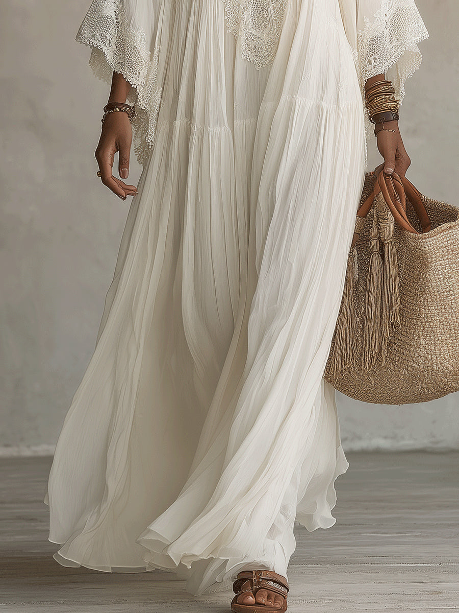 Fiore | Lange ivoorkleurige chiffon jurk met vleermuismouwen en wit kant