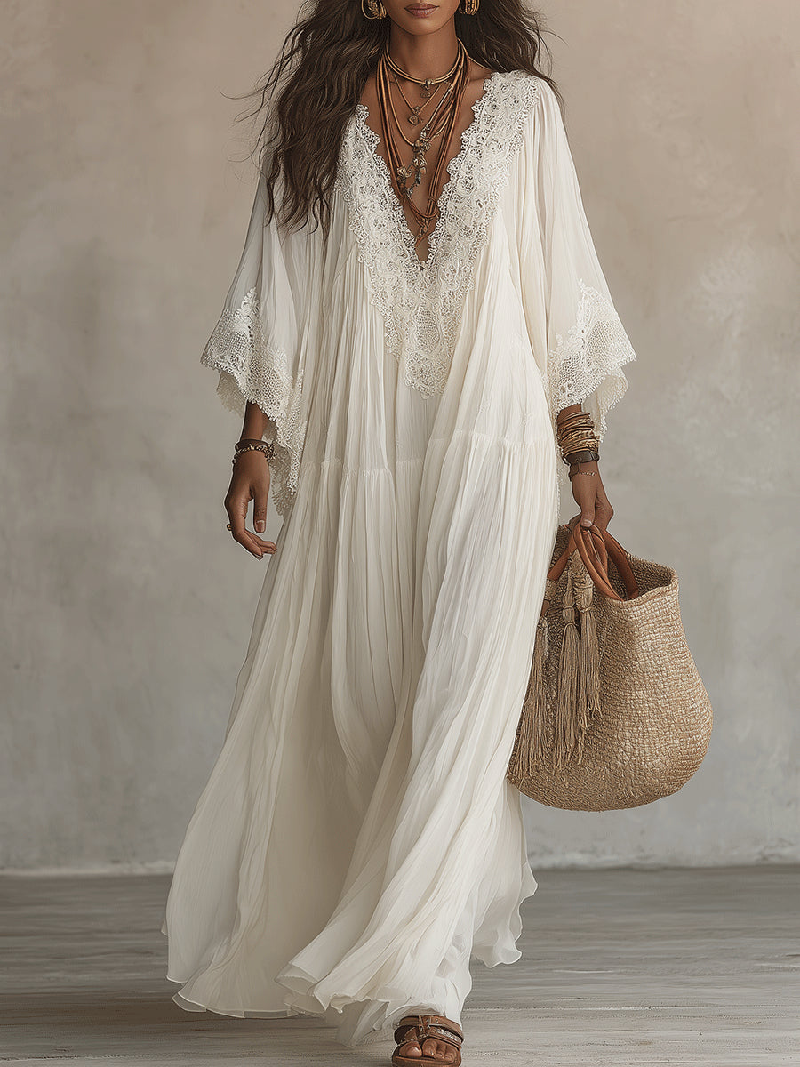 Fiore | Lange ivoorkleurige chiffon jurk met vleermuismouwen en wit kant