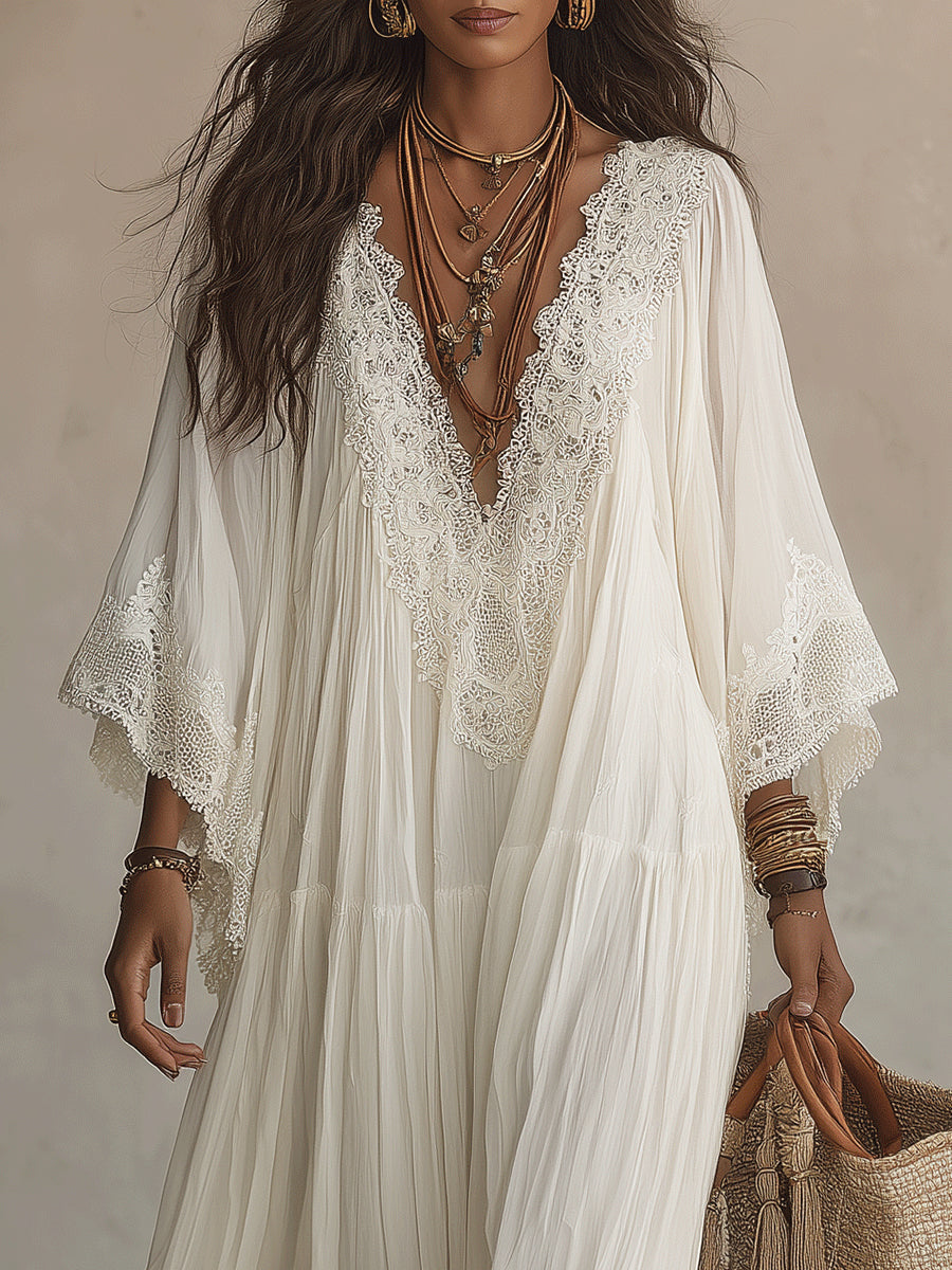 Fiore | Lange ivoorkleurige chiffon jurk met vleermuismouwen en wit kant