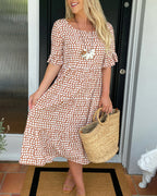 Noor | Midi-jurk met ronde hals en stippenprint