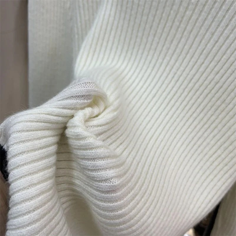Tessa | ELEGANTE COLLO ALTO TRUI