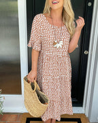 Noor | Midi-jurk met ronde hals en stippenprint